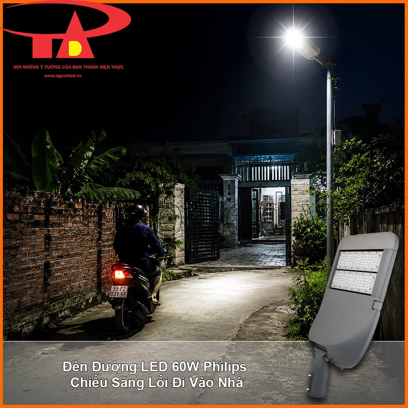 Đèn LED chiếu sáng đường 60W lắp tại lối vào văn phòng, hỗ trợ xe máy và người đi bộ quan sát buổi tối