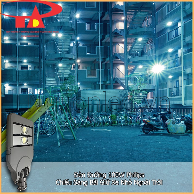 Đèn LED đường phố 100W chiếu sân đậu xe nhỏ ngoài trời, có xe máy, xe đạp, sân chơi và nhà cao tầng