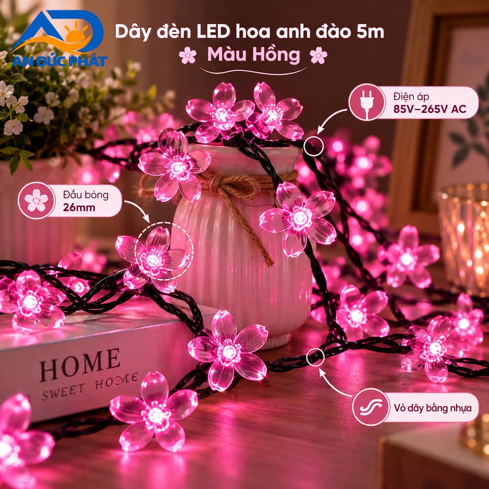 Dây đèn LED hoa anh đào 5m màu hồng phát sáng, minh họa đầu hoa 26mm và điện áp 85–265V AC.