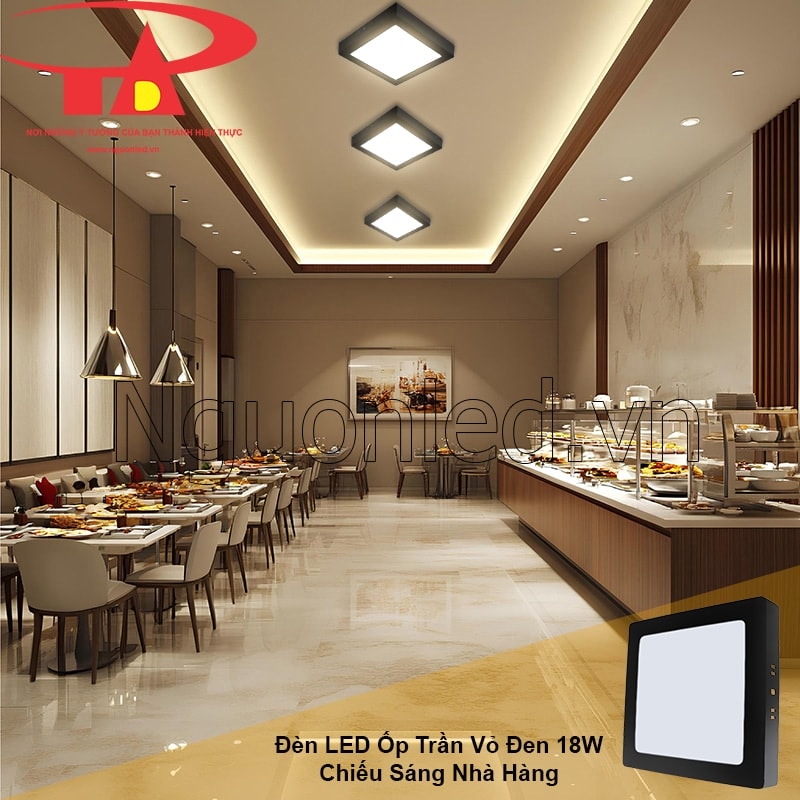 Không gian nhà hàng ấm cúng với ánh sáng vàng ấm từ đèn led ốp trần vuông viền đen